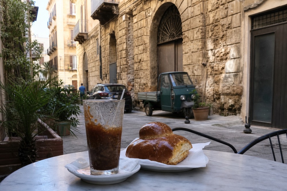 Coffee granita with brioche served on a cafe table